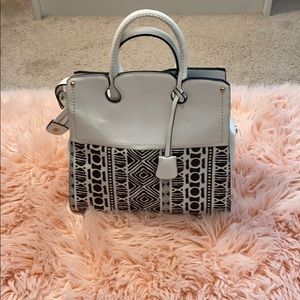 White and black purse.